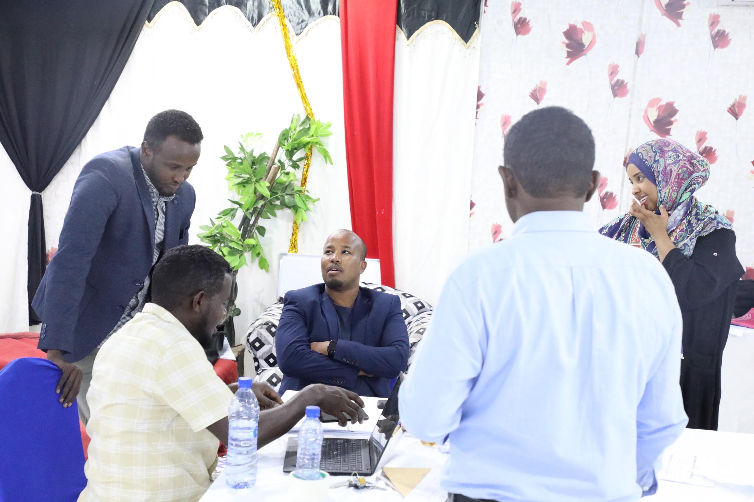 Partners and delegates between sessions at a HASI event